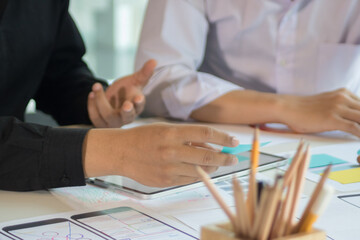 close-up view of young ui development team working together in office