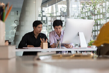 close-up view of young ui development team working together in office