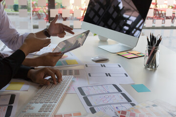 close-up view of young ui development team working together in office