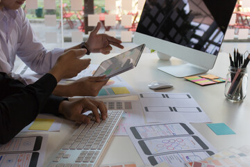 close-up view of young ui development team working together in office