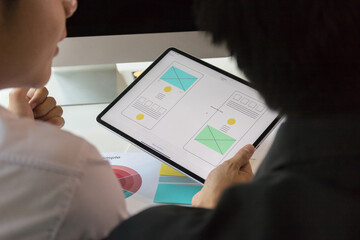 close-up view of young ui development team working together in office