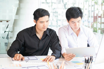 close-up view of young ui development team working together in office