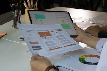 close-up view of young ui development team working together in office