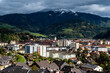 panoramic view of Bruck an der Mur city and the Rennfeld mountain in Styria, Austria on a sunny-cloudy autumn day