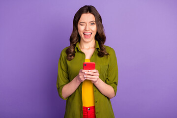 Wall Mural - portrait of excited energetic girl use smartphone enjoy searching social media news wink blink wear 
