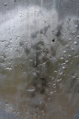 Detail of a ship rudder showing rivets, a welded seam and pitting in the metal.