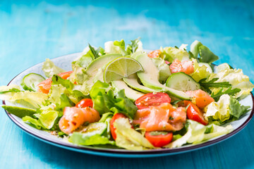 Wall Mural - Healthy salad with smoked samlmon and avocado