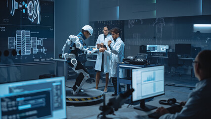 Poster - In Robotics Development Laboratory: Engineers and Scientists Work on a Bionics Exoskeleton Prototype with Person Testing it. Designing Wearable Exosuit to Help Disabled People, Warehouse Workers