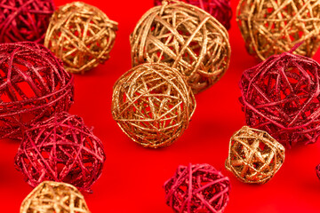 Canvas Print - Christmas wooden colorful balls on red background.