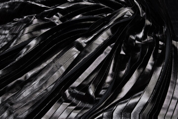 Wall Mural - Close-Up pleated and silver foil printed black fabric. Material textile and leather.