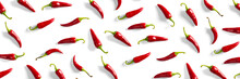 Creative Background Made Of Red Chili Or Chilli On White Backdrop. Minimal Food Backgroud. Red Hot Chilli Peppers Background.