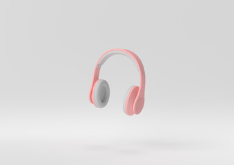 Wall Mural - Creative minimal paper idea. Concept white and pink headphone with white background. 3d render, 3d illustration.