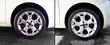 Before and after iron remover treatment on car wheels. Close up of automobile tire during the removal of ferrous residues. How to avoid iron contamination. Rims turn purple after applying iron remover