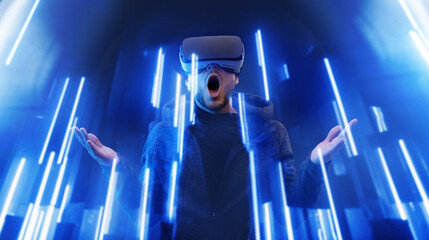 Young happy man in hoodie on virtual reality background. Guy using VR helmet. Augmented reality, future technology, game concept. Blue neon light.