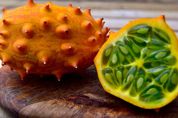 Wall Mural - Fresh exotic organic orange Kiwano