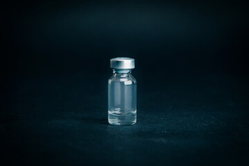 close up. medical ampoule on a dark background.