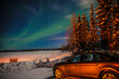 Northern Lights on a full moon night, Fairbanks, Alaska. Chena Lake Recreation Area in winter