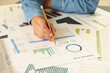 © Atlas - Young business woman doing a financial planning