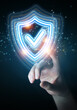 © sdecoret - Man hand using digital shield protection blue holographic interface 3D rendering