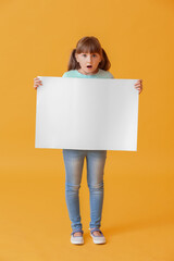 Sticker - Surprised little girl with blank paper sheet on color background