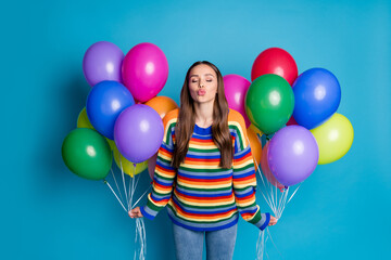 Poster - Photo of charming girl hold many balloons 14-february gift send air kiss wear sweater jeans isolated over blue color background