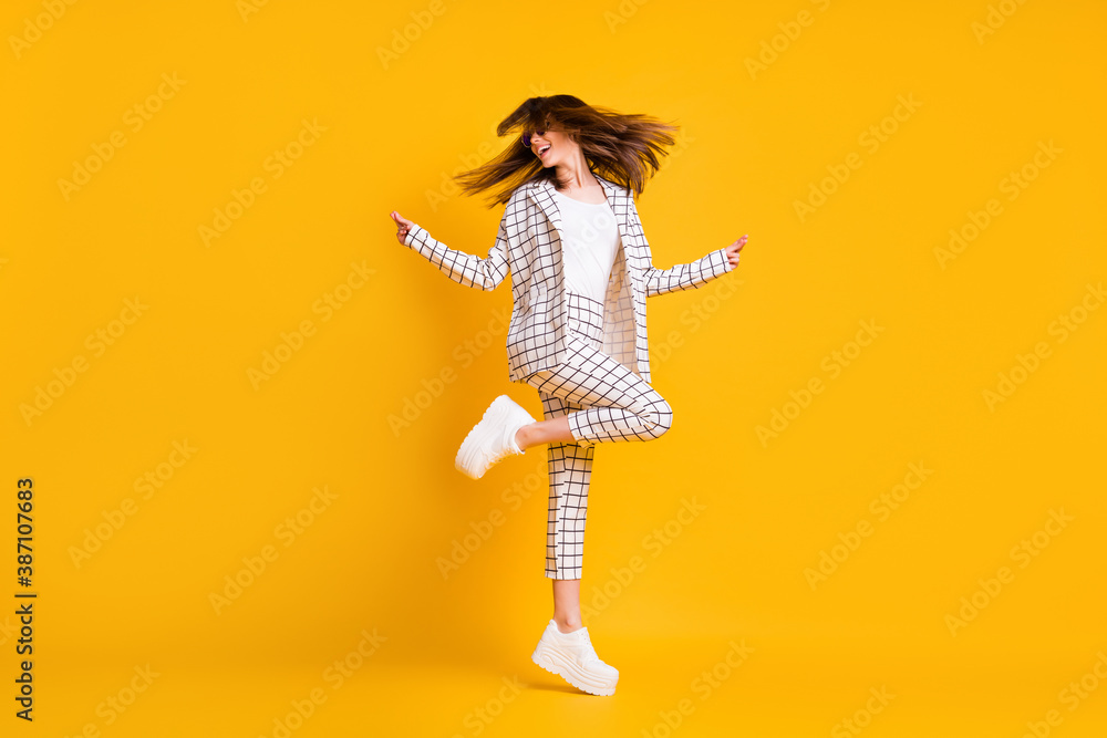 Full length body size side profile photo of girl wearing white checkered suit roung sunglass dancing isolated on vivid color background - obrazy, fototapety, plakaty 