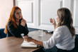 © irissca - Mental health concept. Communication session of woman psychologist and client. Psychotherapy or talk therapy as help people with variety of mental illnesses and emotional difficulties