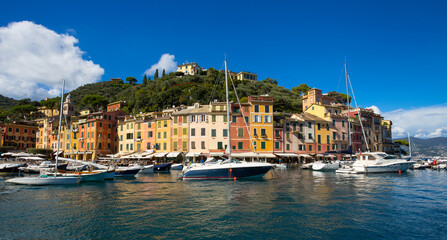 Wall Mural - PORTOFINO, ITALY, SEPTEMBER 1, 2020 - View of Portofino, an Italian fishing village, Genoa province, Italy. A famous tourist place with a picturesque harbour and colorful houses.