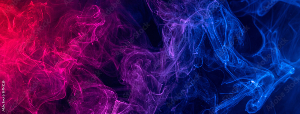Conceptual image of colorful red and blue color smoke on dark black background. - obrazy, fototapety, plakaty 