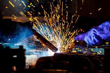 Wall Mural - Hand welded steel mill in the factory.