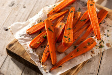 Honey Glazed Carrots On Rustic Wooden Table