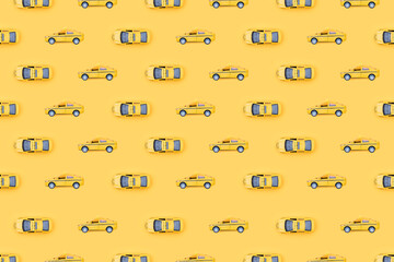 Seamless pattern on the theme of taxi. Yellow pattern.