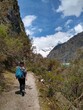 © Agata - Girl at Laguna Paron, Huaraz, Peru. A blue-green lake in the Cordillera Blanca on the Peruvian Andes. At 4185 meters above sea level, it's surrounded by snowy peaks and a pyramid mountain.