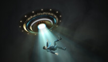 Alien Abduction Concept. Young Man Is Abducted By UFO.