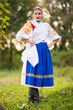 © muro - Slovak folklore. Girl in slovak folk dress.