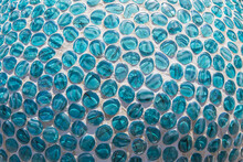 Blue Glass Pebbles Cemented On A Spherical Surface