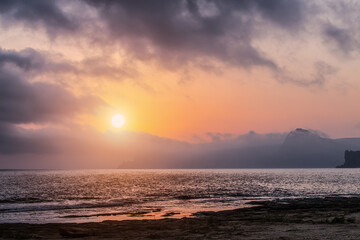 Canvas Print - Sunset over the Mountains on the Seashore