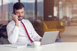 © FS-Stock - Businessman With Laptop And Smartphone At Office