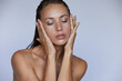 © Flamingo Images - Woman touching her perfect complexion