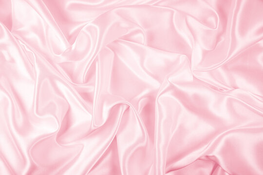 Wall Mural - Beautiful elegant wavy light pink satin silk luxury cloth fabric texture, abstract background design. Copy space