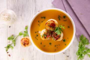 Wall Mural - bowl of soup with scallop