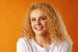 © fotofabrika - Gorgeous beautiful young woman with curly hair posing at camera