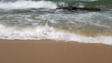 Wall Mural - Slow motion footage of tropical sandy beach under bright sunny day