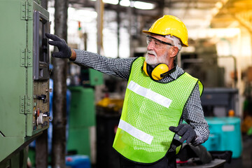 Wall Mural - Mechanical Engineering control lathe machine in factory facility. Safety First at work place.