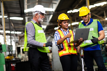 Wall Mural - Professional Mechanical Engineer team Working on Personal Computer at Metal lathe industrial manufacturing factory. Engineer Operating  lathe Machinery. Product quality Inspection