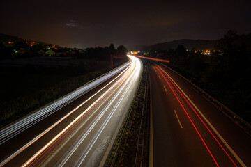 Car and truck traffic lights in night road