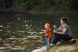 © makam1969 - mother with little son by the water on the lake