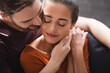 © LIGHTFIELD STUDIOS - tender man touching face of beloved woman sitting with closed eyes
