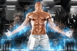 © Mike Orlov - Muscular man athlete in fitness gym have havy workout. Fitness sports trainer on trainging with barbell. Energy and power.