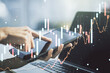 © Pixels Hunter - Multi exposure of abstract creative financial chart with finger presses on a digital tablet on background, research and analytics concept